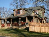 The exterior and right side of the Henry project's house
