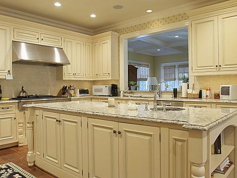 A marble and creme kitchen from Stanmore Drive's home renovation project