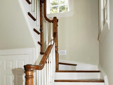 Bright, modern staircase with natural wood highlights